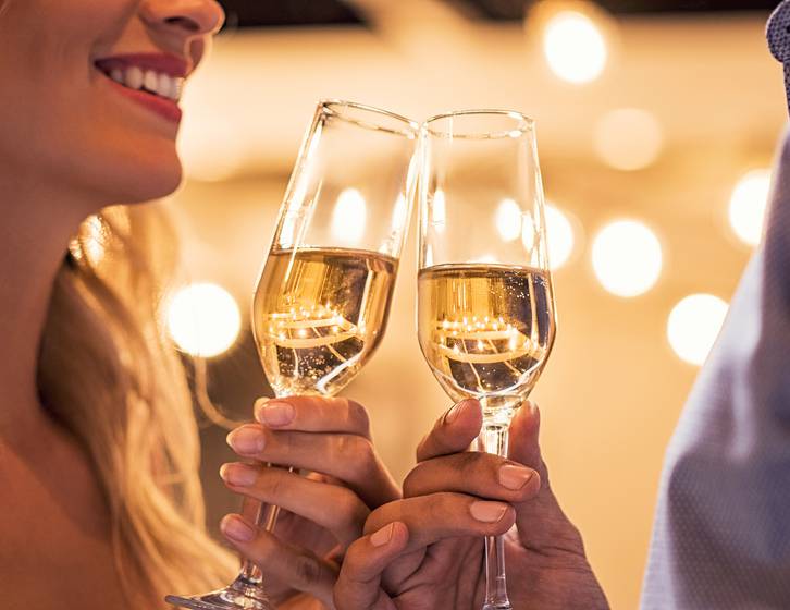 bigstock-Man-and-woman-toasting-champag-264123454.jpg